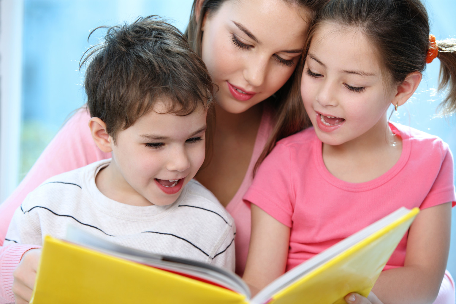 Nanny reading to children